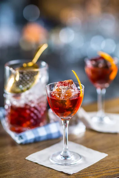 Manhattan cocktail drink decorated on bar counter in pub or restaurant — Stock Photo, Image