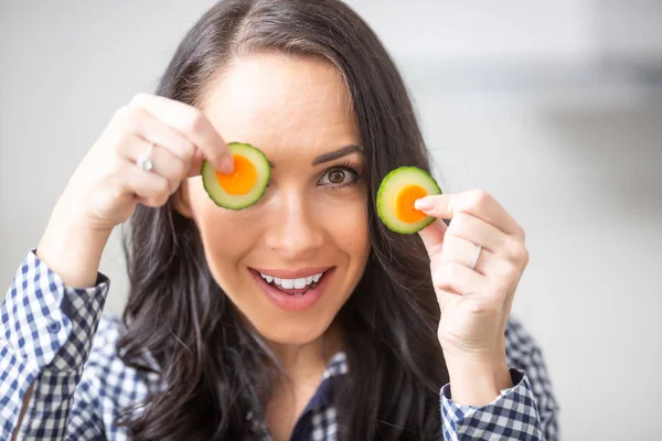 Playful Young Woman Holding Slices Carrot Cucumber Kitchen Diet Vegetable — Stock Photo, Image