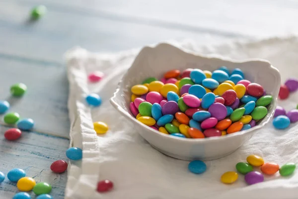 Smarties Put White Porcelain Bowl Scattered White Clothe Table — Stock Photo, Image