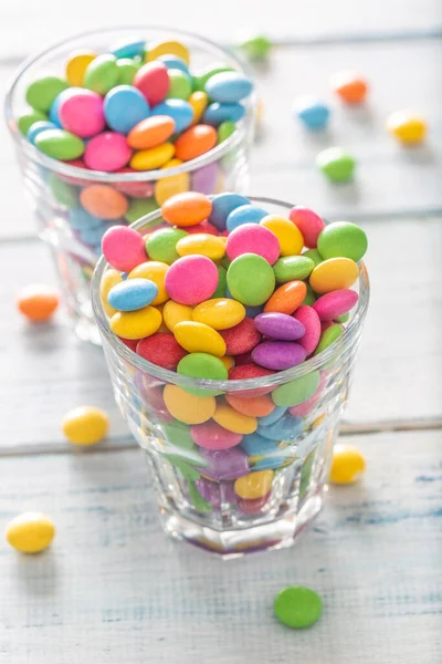 Two Glasses Full Sweet Colorful Treats Some Them Fallen Out — Stock Photo, Image