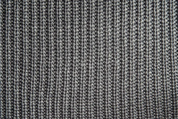 Fond de texture de tricot gris foncé ou fond de motif tricoté. Tricot ou fond tricoté vue rapprochée . — Photo