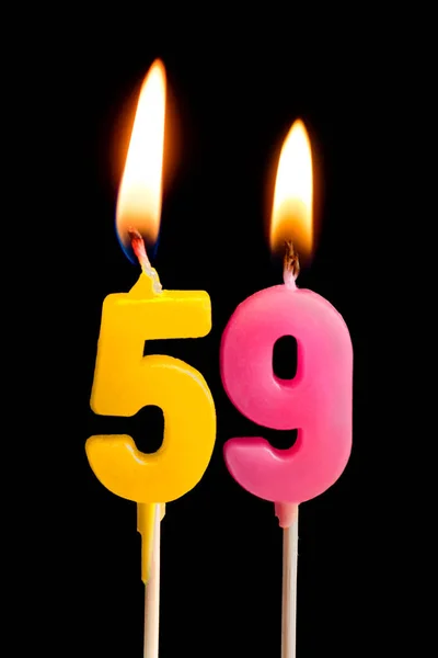 Queimando velas na forma de 459 cinquenta e nove (números, datas) para bolo isolado em fundo preto. O conceito de celebrar um aniversário, aniversário, data importante, feriado, configuração de mesa — Fotografia de Stock