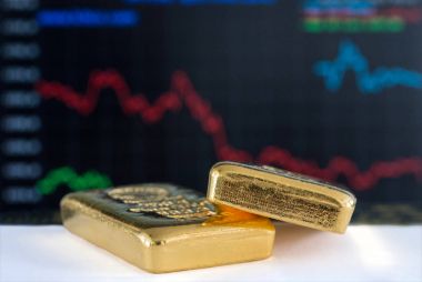 Altın külçelerini azaltma grafiğin arka plan üzerinde. Seçici odak. 