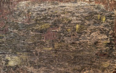 Panoramik formatta boya izleri olan eski kontrplak yüzeyinin dokusu.