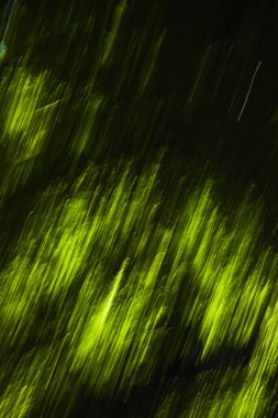 Parlak bir arka plan. Siyah arka planda parlak yeşil çizgiler. Mavili