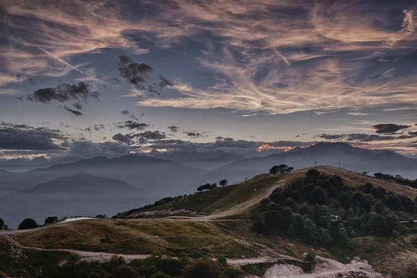 Summer sunset on the top of the mountain — Stock Photo, Image