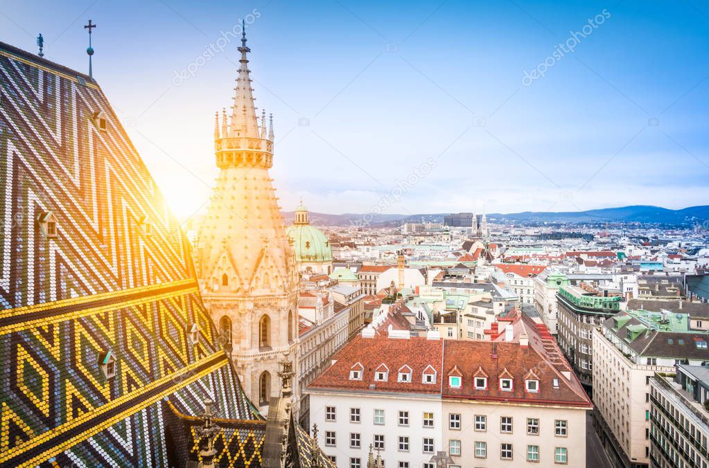 Vienna skyline with famous St. Stephen's Cathedral roof at sunset, Austria