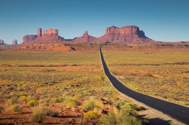 Monument Valley with U.S. Highway 163 at sunset, Utah, USA clipart