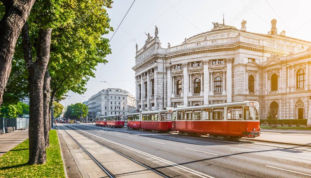 Wiener Ringstrasse with Burgtheater and tram at sunrise, Vienna, Austria