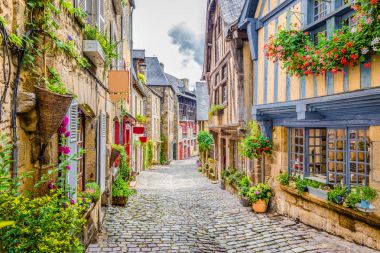 Beautiful alley in an old town in Europe clipart