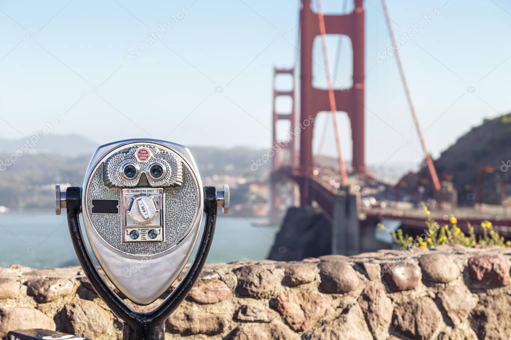 Binoculars with Golden Gate Bridge in the background, San Francisco, California, USA