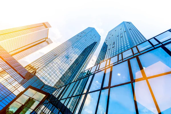 Modern skyscrapers in business district at sunset — Stock Photo, Image