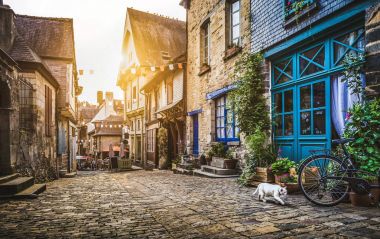 Old town in Europe at sunset with retro vintage Instagram style  clipart