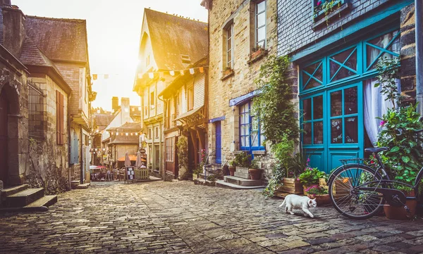 Old town in Europe at sunset with retro vintage Instagram style filter effect — Stock Photo, Image