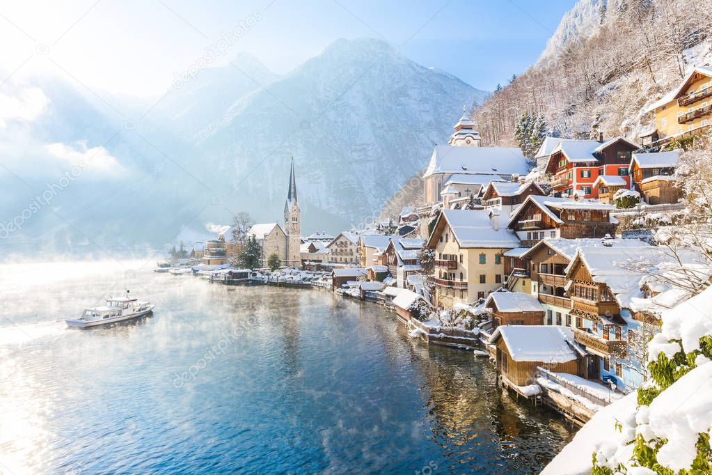 Classic view of Hallstatt with ship in winter, Salzkammergut, Austria