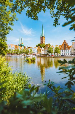 Classic panorama view of the historic city of Luebeck with famous Trave river in summer, Schleswig-Holstein, Germany clipart