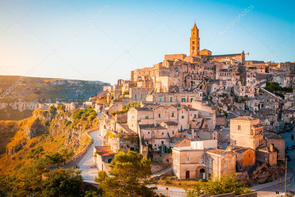 Panoramic view of the ancient town of Matera (Sassi di Matera) in beautiful golden morning light at sunrise, Basilicata, southern Italy