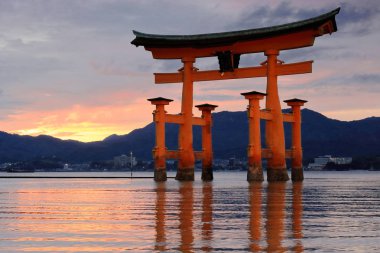 Great Torii of Itsukushima shrine at sunset. Miyajima-Japan. 7017 clipart