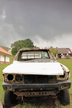 Remains of old abandoned car. Olal village-Ambrym island-Vanuatu. 6052 clipart