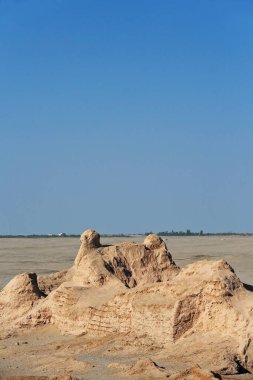 Ruins of the large rectangular Tibetan fort from the Tang dinasty active in the VIII-IX centurys. Ancient town of Miran-old caravan track to Dunhuang-Southern Silk Road. Ruoqiang county-Xinjiang-China clipart