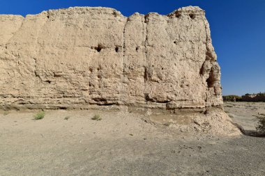 Rammed earth walls-ruins of ancient Pochengzi watchtower fortress-part of the Han era frontier defenses-border post on the western limits of the Chinese empire. Guazhou county-Gansu province-China. clipart