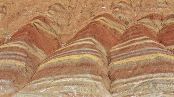 Spectacular colorful rusty sandstone and siltstone landforms of Zhangye Danxia-Red Cloud Nnal.Geological Park so called Rainbow Mountains-E.foothills of the Qilian Range. Zhangye-Gansu province-China.