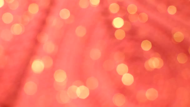 Pink background. blurred light golden lights. Bokeh — Stock Video