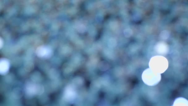 Déplacement des lumières à paillettes bleues, la lumière est réflexions 