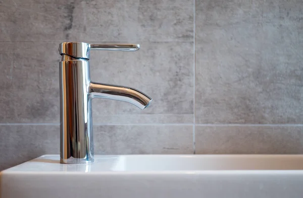 Faucet on the washbasin in the bathroom — Stock Photo, Image