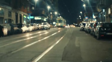 defocus. tram rides around the night city