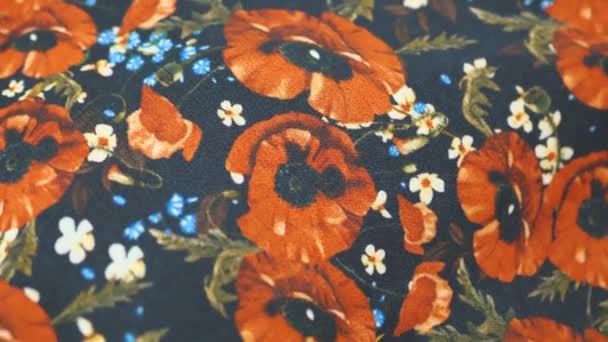 Texture of fabric on red poppies fabric. Ethnic embroidery. — Stock Video