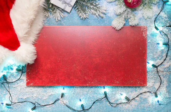 Fondo abstracto de Navidad con sombrero de Santa Claus — Foto de Stock