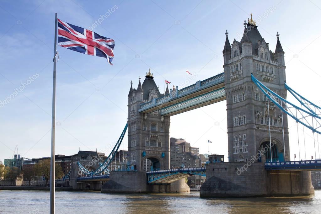 London Tower Bridge and British flags in UK
