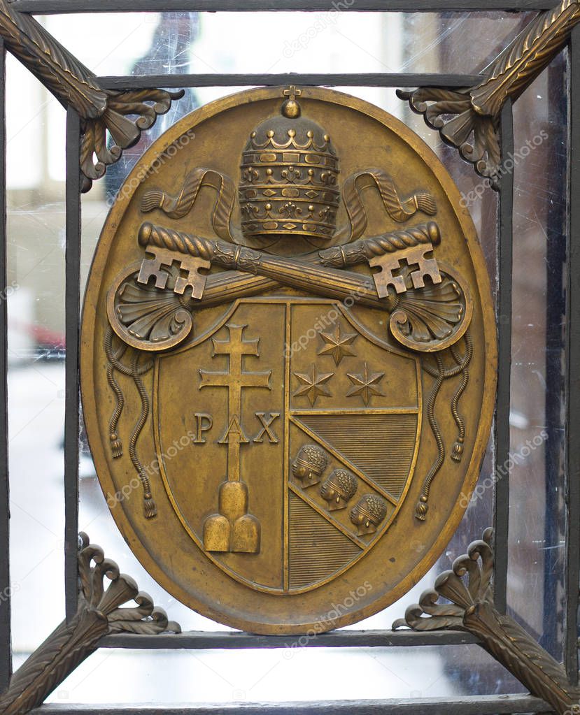 The coats of arms of the Holy See and Vatican City State sign symbol