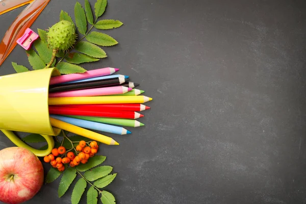 Back to school abstract background with crayons on blackboard — Stock Photo, Image