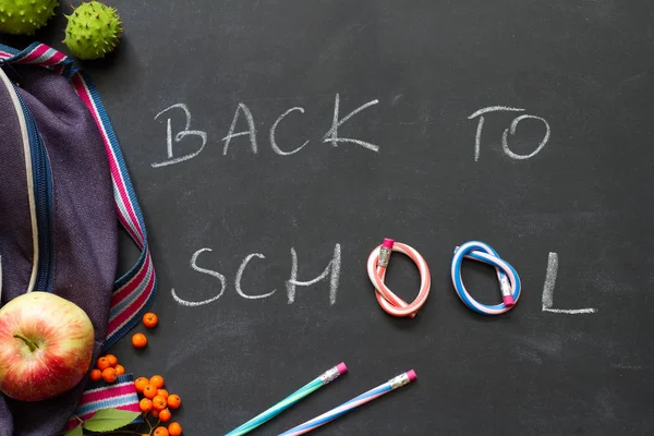 Back to school concept witch chalkboard and supplies — Stock Photo, Image