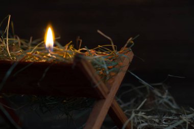 Yemlik İsa ve ışık umut soyut Noel sembolü