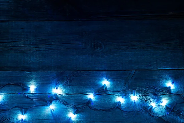 Noel ampul ışıkları gece arka plan içinde — Stok fotoğraf
