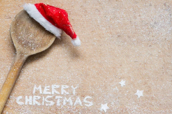 Weihnachtsessen Hintergrund Mit Löffel Weihnachtsmann Hut Und Mehl Frohe Weihnachten — Stockfoto
