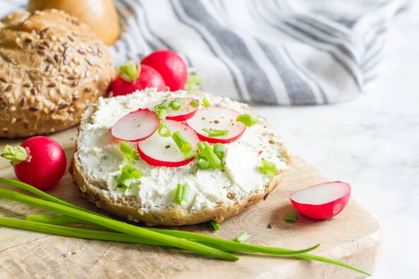 Healthy breakfast sandwich cottage cheese and radish food still life