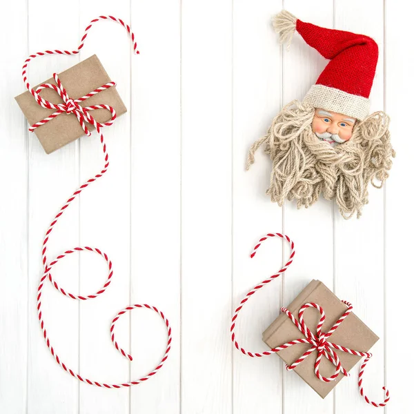 Christmas decoration gift boxes Santa Claus Flat lay — Stock Photo, Image
