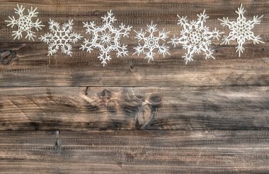 Ahşap arka plan christmas dekorasyon kar taneleri sınır