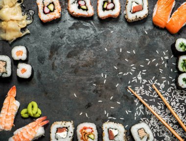 Sushi rolls maki nigiri wasabi  Japanese food background clipart