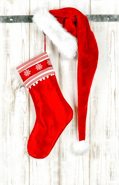 Christmas stocking Decoration red ornaments wooden background — Stock Photo, Image