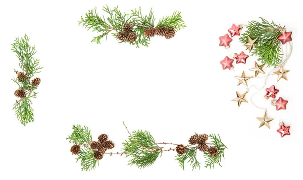 Evergreen branches cones baubles Christmas background floral fra — Stock Photo, Image