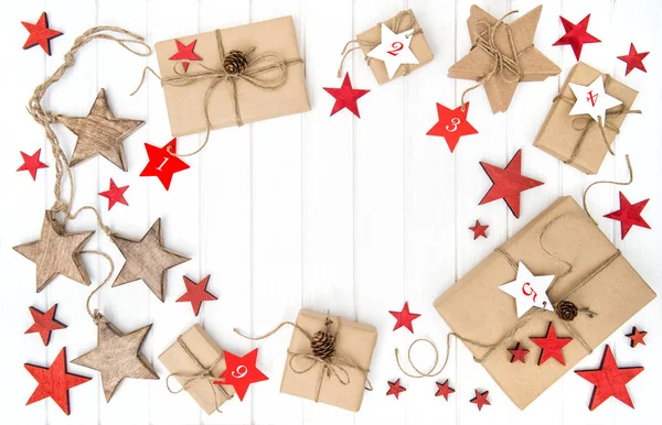 Gifts Advent calendar Christmas decoration stars Flat lay — Stock Photo, Image