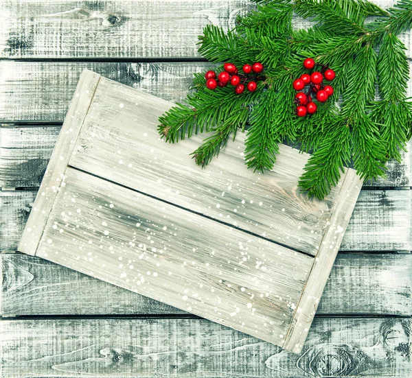 Christmas tree branches rustic wooden background — Stock Photo, Image