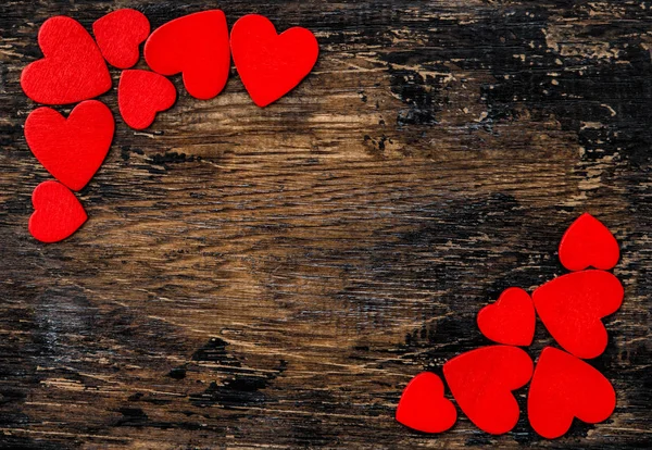 Corazones rojos fondo de madera Día de San Valentín decoración — Foto de Stock