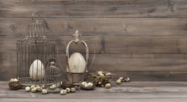 Easter decoration with eggs nest birdcage vintage — Stock Photo, Image