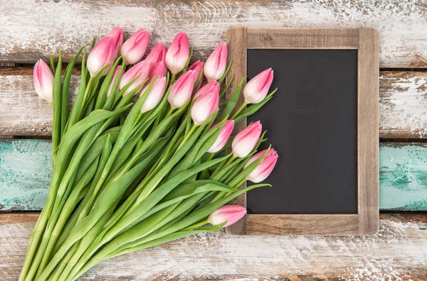 Tulip flowers chalkboard for your text Bouquet pink blooms — Stock Photo, Image